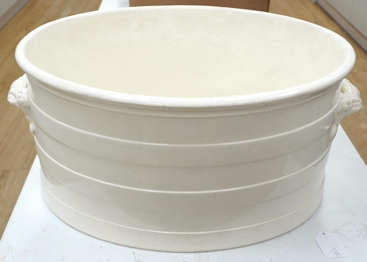 A Victorian Copeland & Garrett 'New Fayence' oval two handled footbath, 56cm wide, 26cm high. Condition - fair